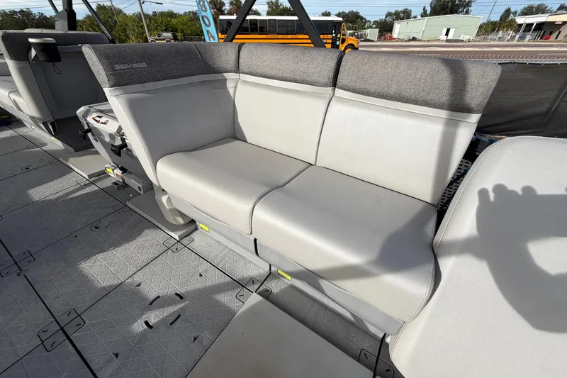 Slide: The Image of 2022 Sea-Doo Switch Sport 21 interior with seating and textured flooring. - 41