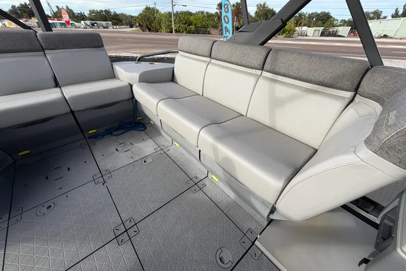 Slide: The Image of Close-up of a 2022 Sea-Doo Switch Sport 21 trailer wheel on pavement. - 47