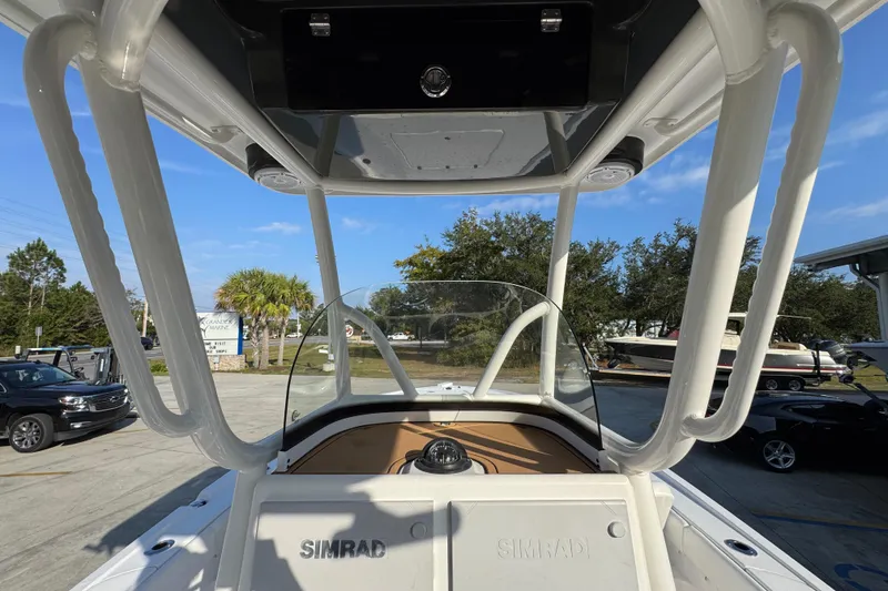 Slide: The Image of 2020 Caymas 28 HB boat with Simrad electronics, viewed from the helm. - 32