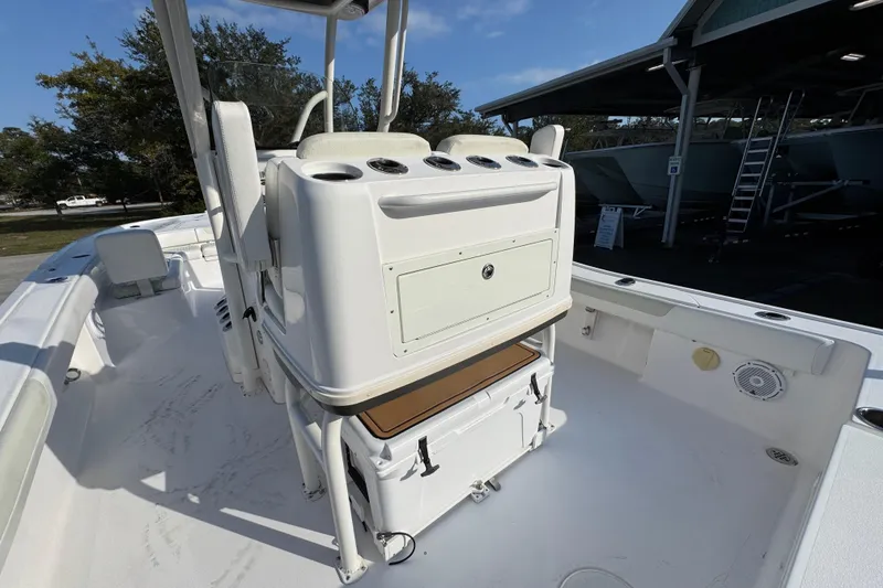 Slide: The Image of 2020 Caymas 28 HB boat interior with seating and storage compartments. - 36