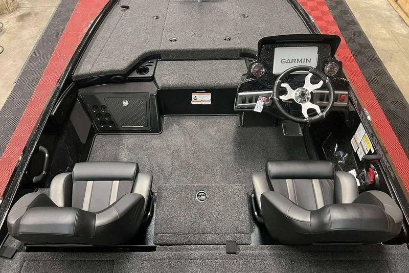 Slide: The Image of 2026 Nitro Z18 Pro boat interior with Garmin navigation, dual seats, and sleek dashboard design. - 4