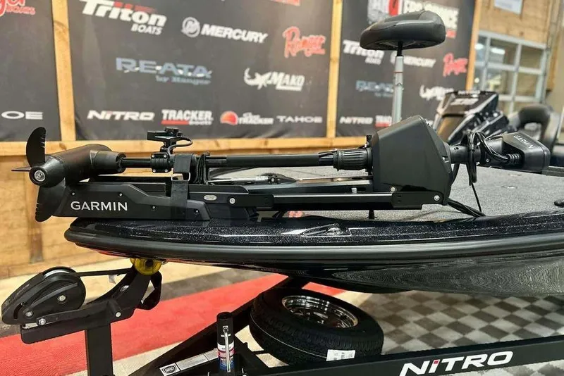 Slide: The Image of 2026 Nitro Z18 Pro boat with Garmin trolling motor on display. - 6