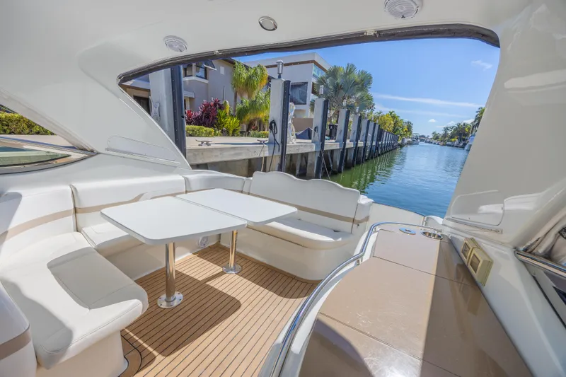 Slide: The Image of Interior view of 2013 Formula 400 Super Sport yacht with seating and table, dockside. - 21