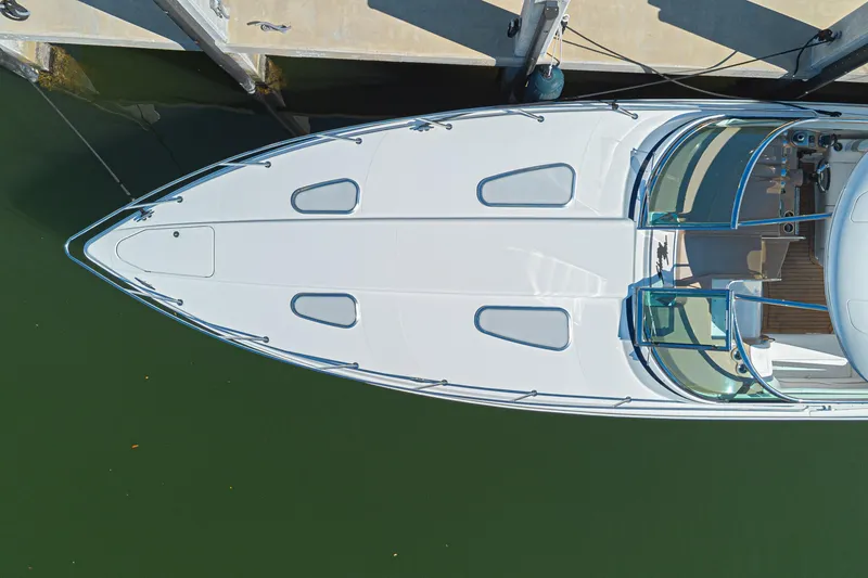 Slide: The Image of Overhead view of a 2013 Formula 400 Super Sport yacht docked at a marina. - 7
