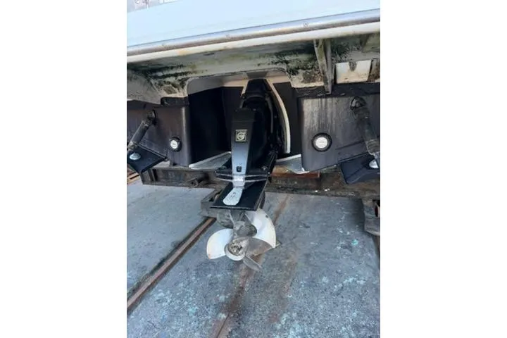 Slide: The Image of 2013 Regal 28 Express boat stern drive and propeller detail. - 38