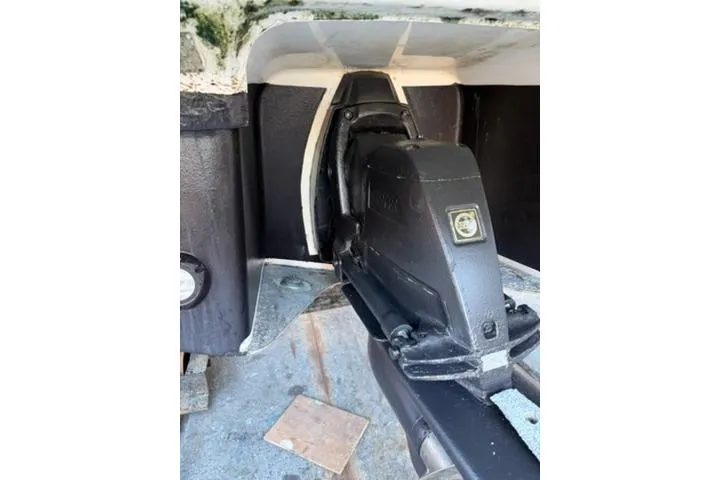 Slide: The Image of 2013 Regal 28 Express boat engine compartment, showcasing mechanical components. - 39