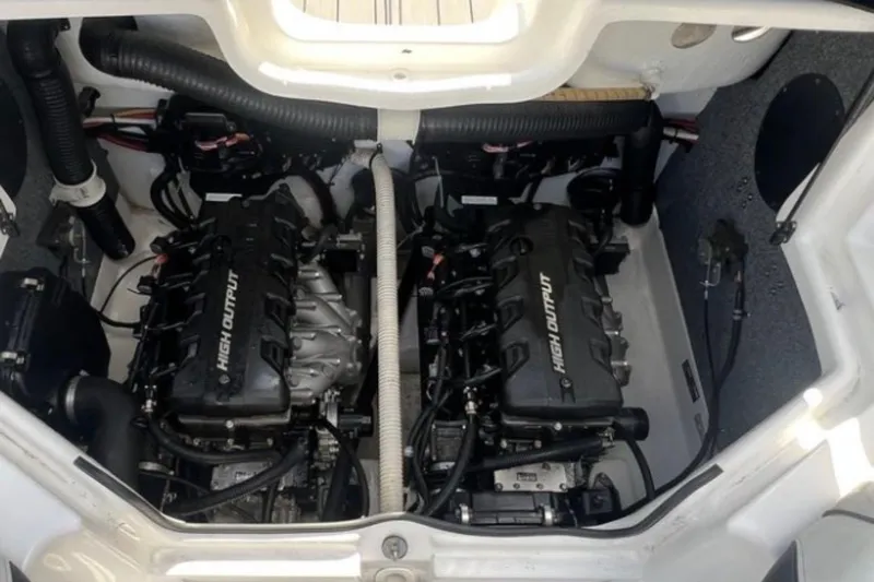 Slide: The Image of 2014 Yamaha AR240 boat engine compartment with dual high output engines. - 4