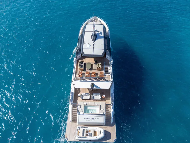 Slide: The Image of Aerial view of 2025 Alpha Squalo Co Ownership yacht on clear blue water. - 10