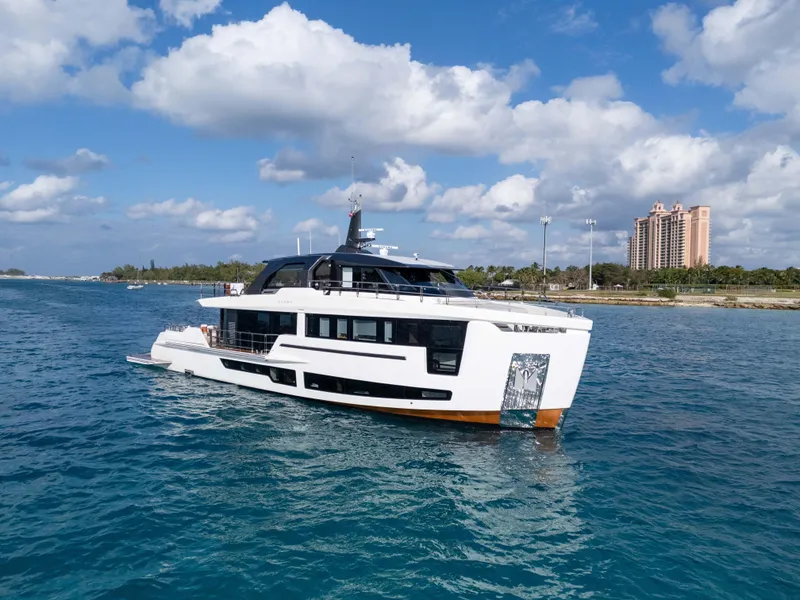 Slide: The Image of Luxurious 2025 Alpha Squalo Co Ownership yacht cruising on clear blue waters. - 3