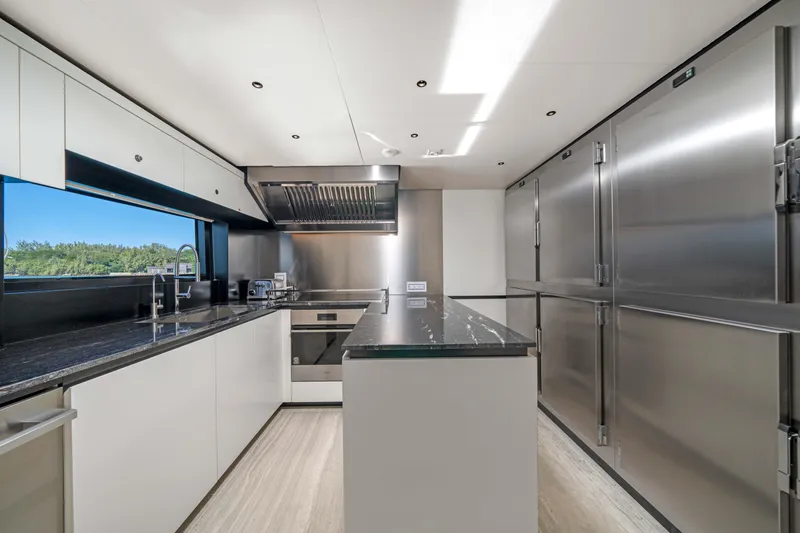 Slide: The Image of Modern kitchen in 2025 Alpha Squalo Co Ownership yacht, featuring sleek design and stainless steel appliances. - 37