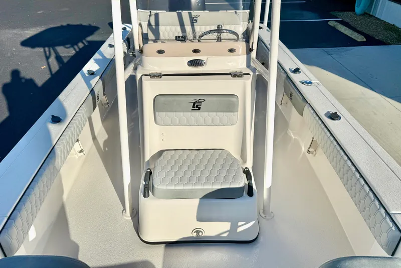Slide: The Image of 2026 Carolina Skiff 24 Ultra Elite boat interior with seating and console. - 20
