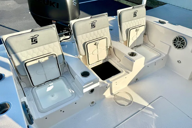Slide: The Image of 2026 Carolina Skiff 24 Ultra Elite boat seating and storage compartments. - 34