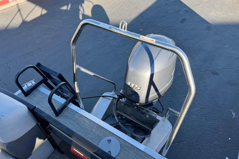 Slide: The Image of 2023 Bennington 22 XSR boat with Yamaha 115 outboard motor, rear view. - 19