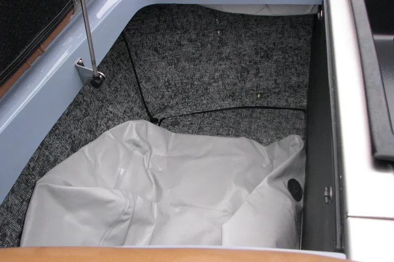 Slide: The Image of Trunk interior of 2026 MB B52-23 Classic LIMITED with gray lining and storage space. - 14