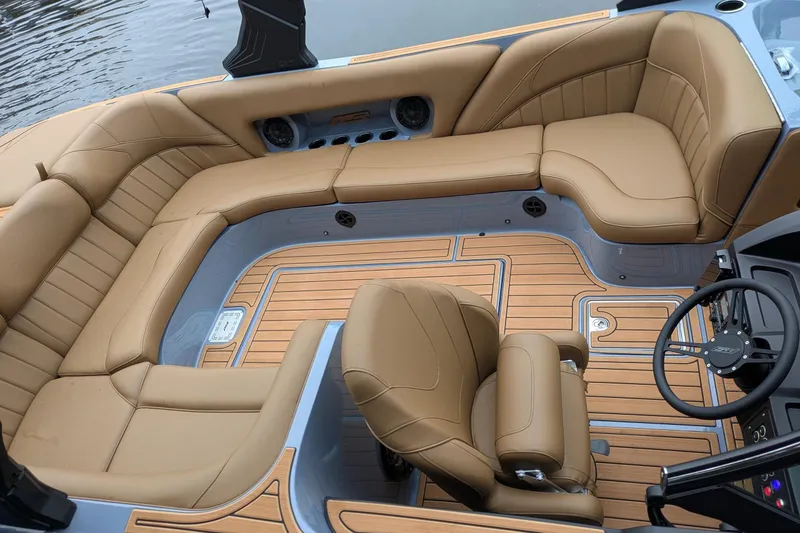 Slide: The Image of Luxurious interior of 2026 MB B52-23 Classic LIMITED boat with tan leather seating. - 25