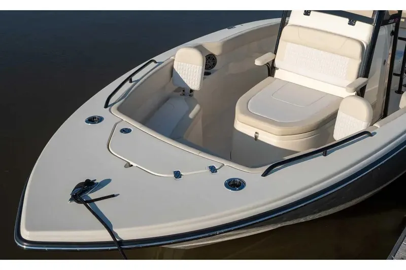 Slide: The Image of Manufacturer Provided Image: 2026 Scout 220 XSF boat with sleek seating and modern design. - 2