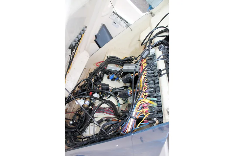 Slide: The Image of Electrical wiring system inside a 2013 Pursuit ST 310 Sport boat. - 35