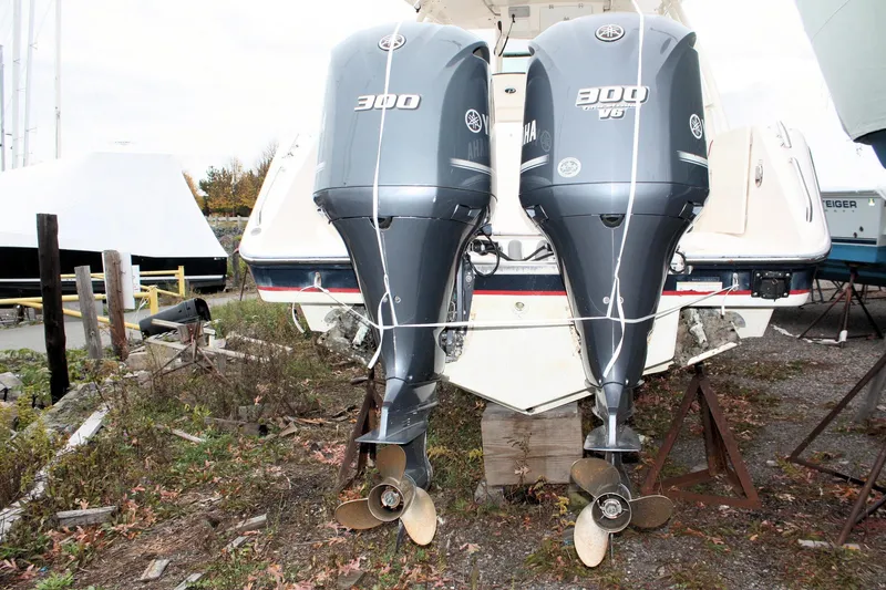 Slide: The Image of 2013 Pursuit ST 310 Sport boat with dual Yamaha 300 V6 outboard engines. - 36