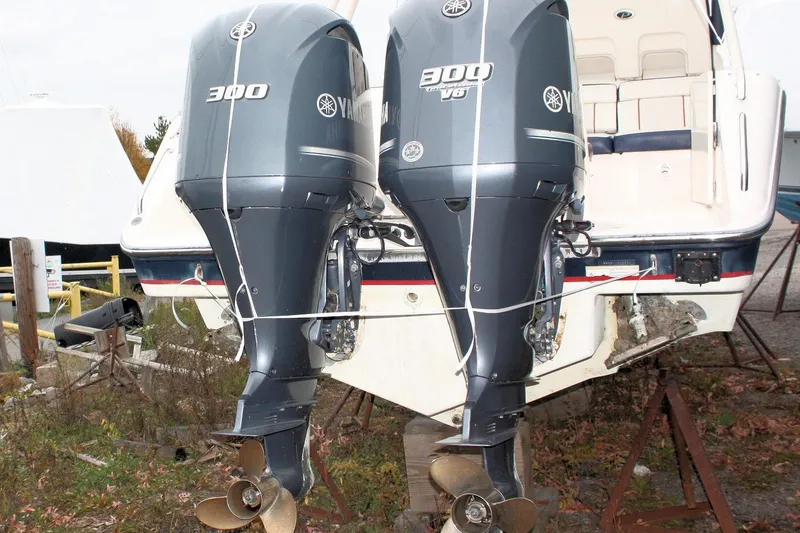 Slide: The Image of 2013 Pursuit ST 310 Sport boat with twin Yamaha 300 V6 outboard engines. - 37