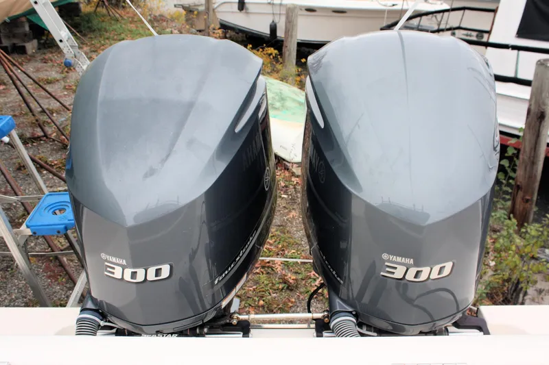 Slide: The Image of Twin Yamaha 300 outboard engines on a 2013 Pursuit ST 310 Sport boat. - 38