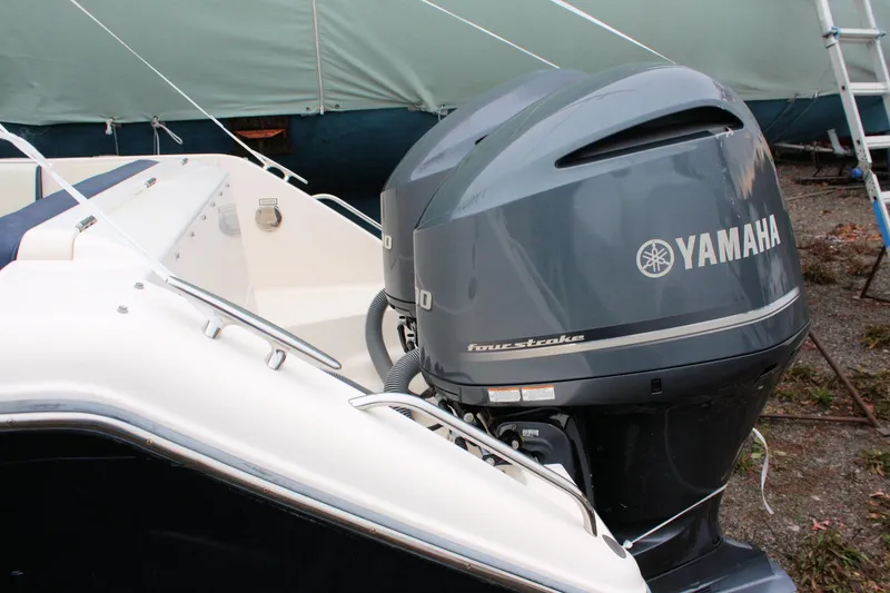 Slide: The Image of 2013 Pursuit ST 310 Sport boat with Yamaha four-stroke engines. - 39
