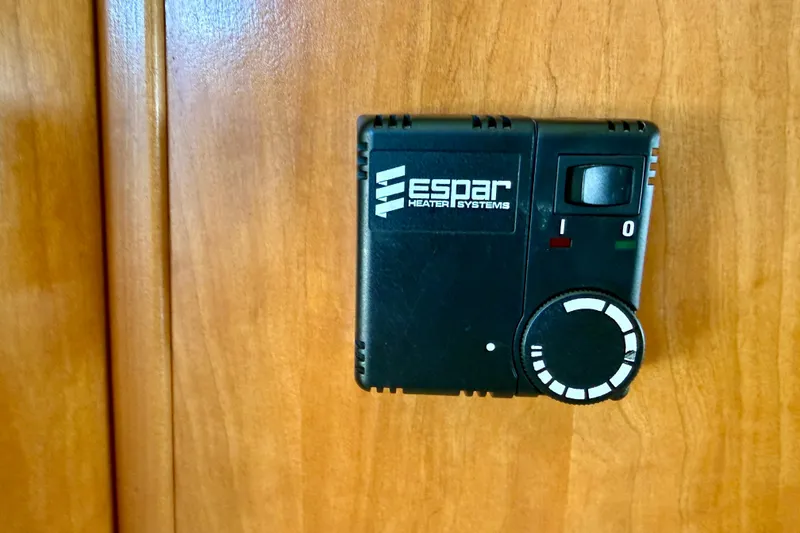 Slide: The Image of Simrad display on 2004 Meridian 490 Pilothouse dashboard with wood paneling. - 25