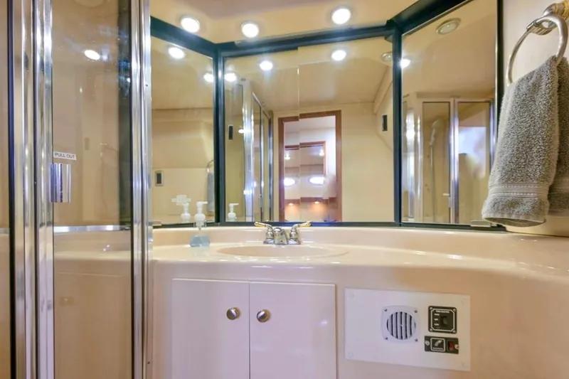 Slide: The Image of Bathroom interior of 2004 Meridian 490 Pilothouse yacht with shower and sink. - 44
