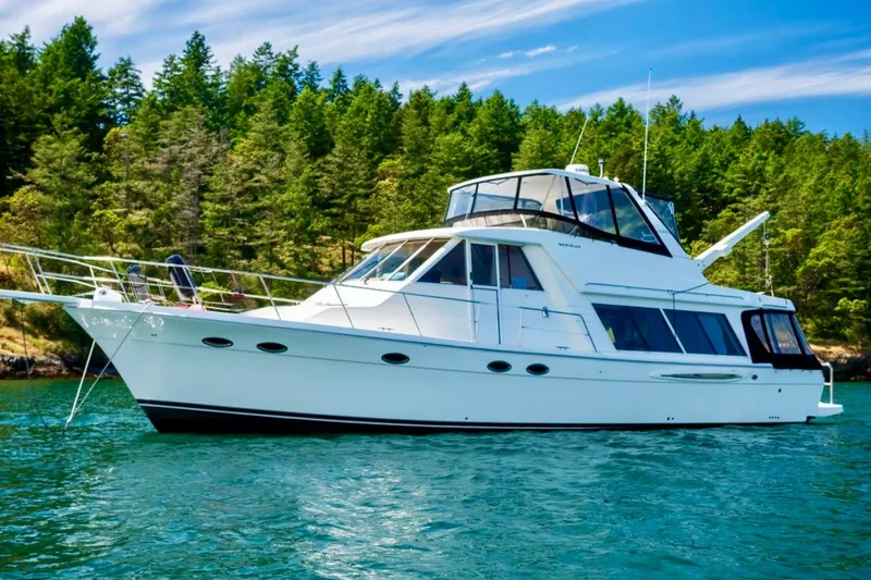 Slide: The Image of 2004 Meridian 490 Pilothouse on calm waters. - 6