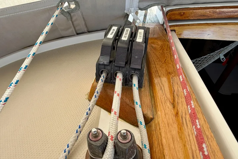 Slide: The Image of Rope clutches and lines on a 1988 Catalina 36 sailboat deck. - 11