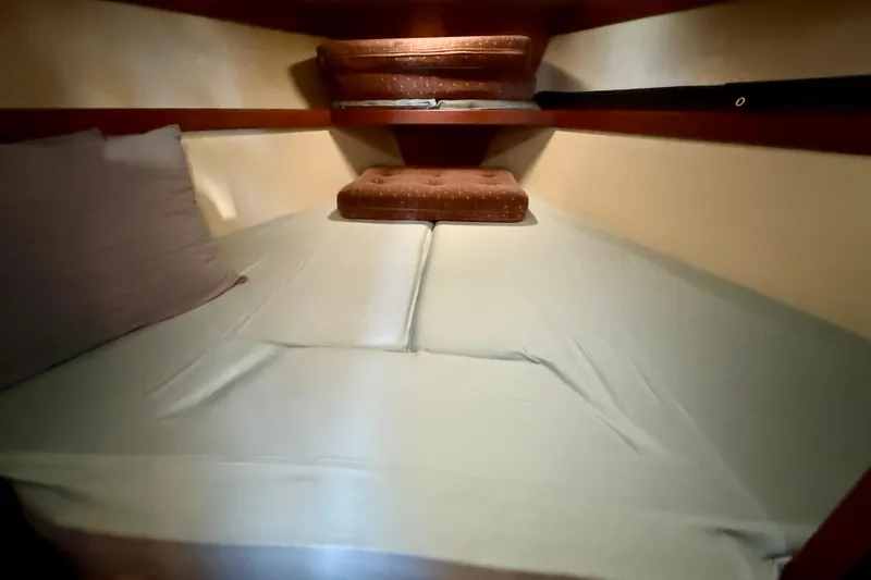 Slide: The Image of Cozy cabin interior of 1988 Catalina 36 sailboat with comfortable bedding. - 37