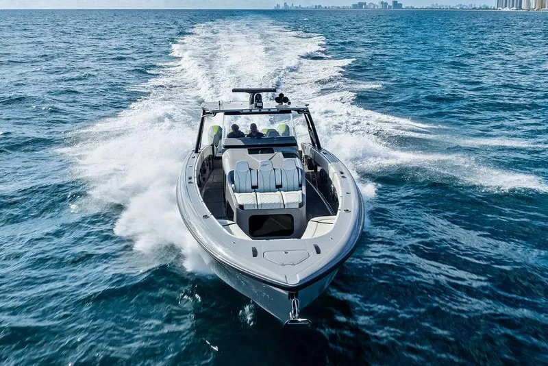 Slide: The Image of 2022 Midnight Express 43' Solstice boat cruising on open water. - 11