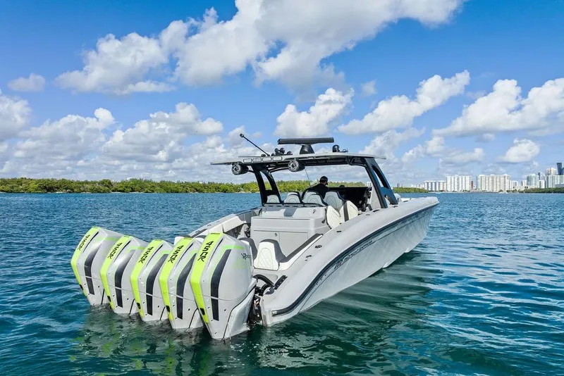 Slide: The Image of 2022 Midnight Express 43' Solstice boat with quad engines on open water. - 20