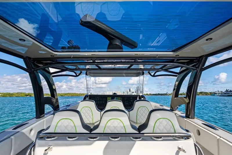 Slide: The Image of 2022 Midnight Express 43' Solstice boat interior with scenic ocean view. - 35