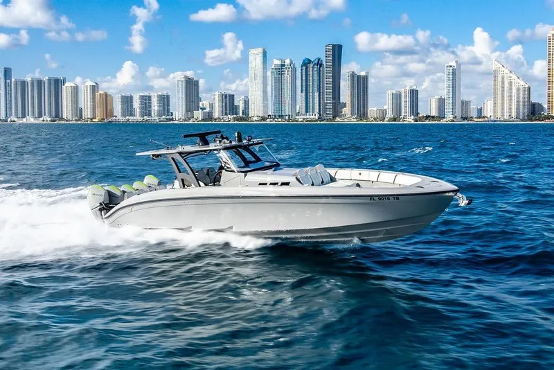 The Image of 2022 Midnight Express 43' Solstice cruising near city skyline on a sunny day. - 4