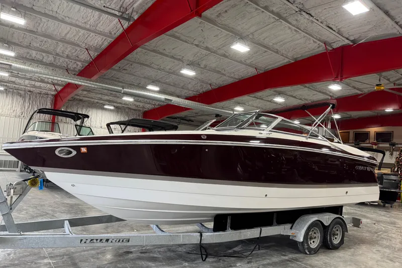 Slide: The Image of 2005 Cobalt 282 boat on trailer in indoor storage facility. - 2