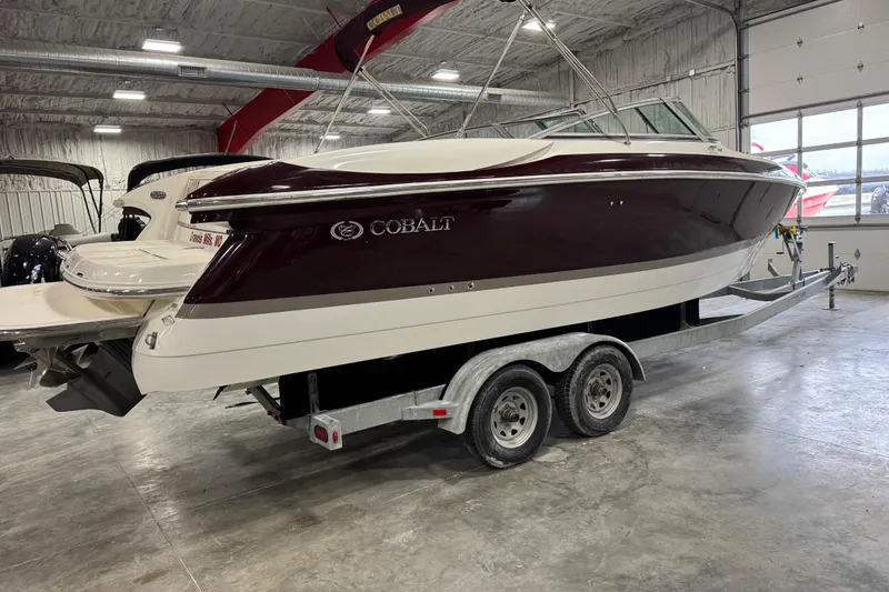 Slide: The Image of 2005 Cobalt 282 boat on trailer in indoor storage facility. - 4