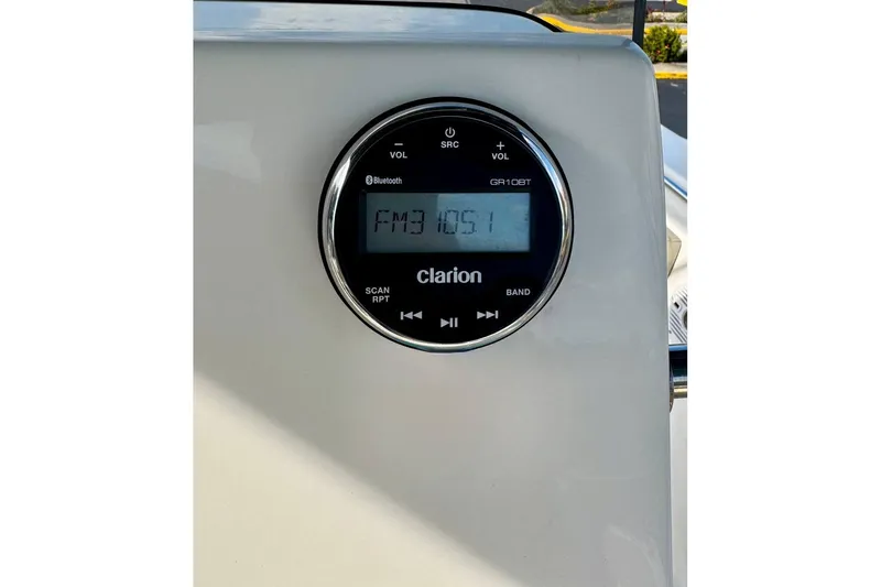 Slide: The Image of Clarion radio display on 2023 Key West 219 FS boat dashboard. - 22