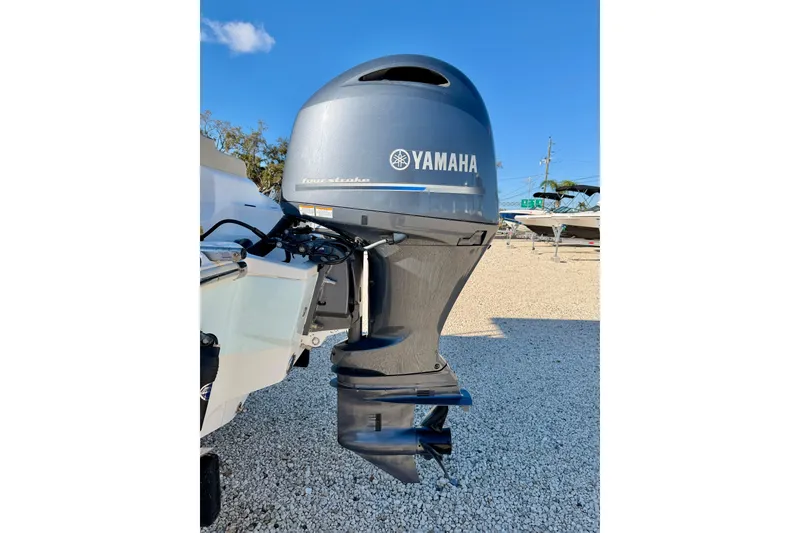 Slide: The Image of 2023 Key West 219 FS boat with Yamaha four-stroke outboard motor. - 31