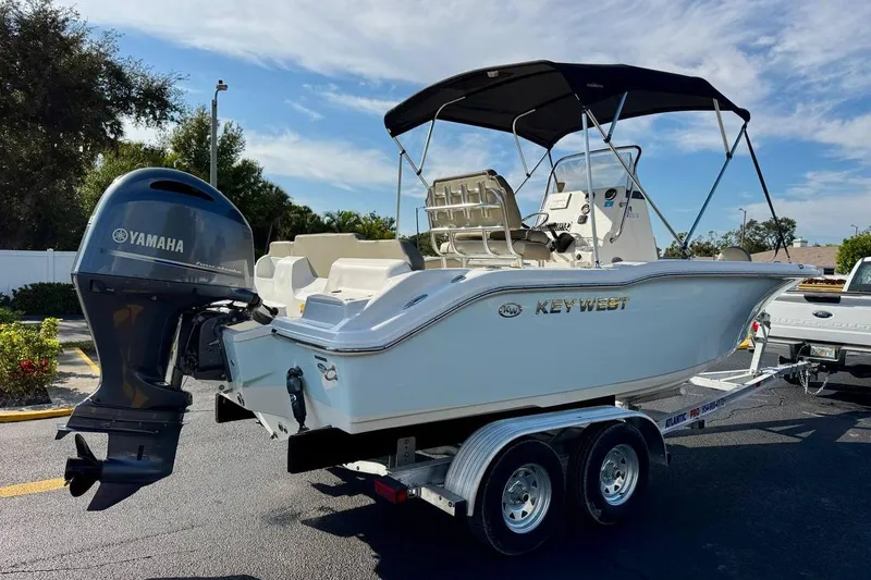 Slide: The Image of 2023 Key West 219 FS boat on trailer with Yamaha outboard motor. - 6