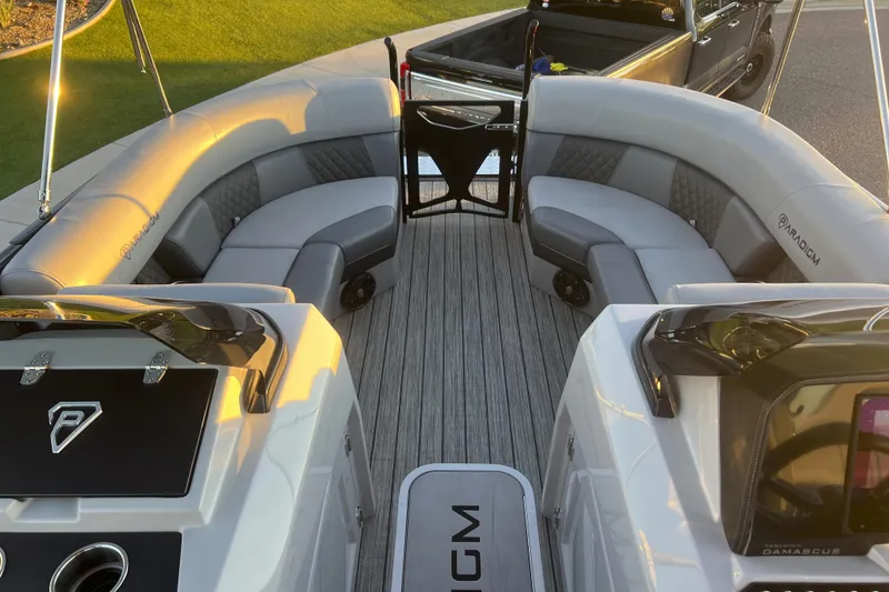 Slide: The Image of 2025 Paradigm 27SST boat interior with luxurious seating and modern design. - 11
