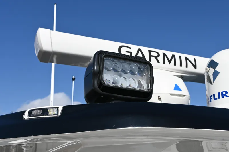 Slide: The Image of 2025 Tidewater 320 CC Adventure boat with Garmin and FLIR technology. - 13