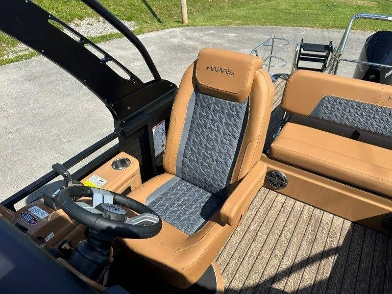 Slide: The Image of Interior of 2026 Harris Solstice 230 SL with luxurious seating. - 16