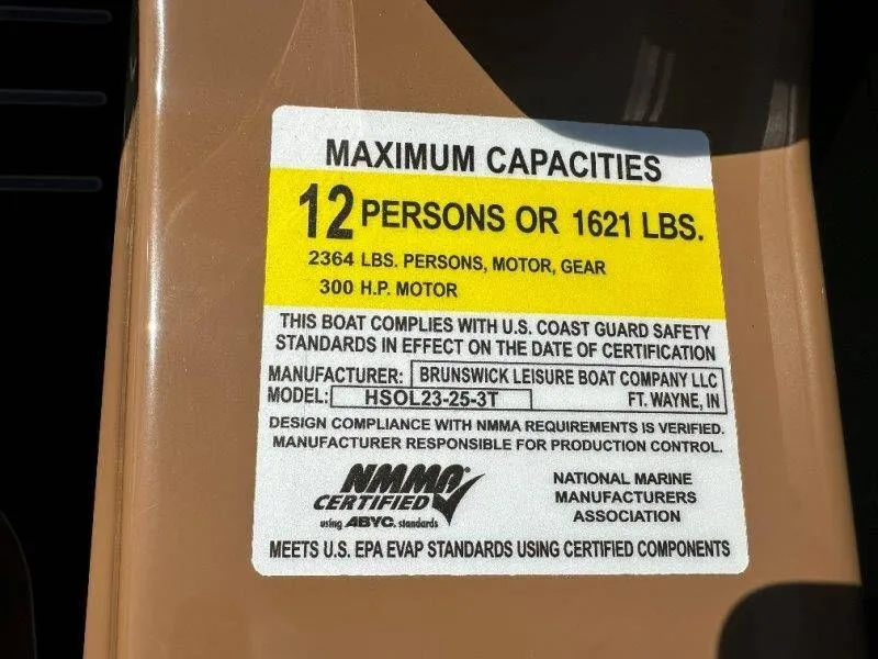 Slide: The Image of Harris Solstice 230 SL 2026 boat capacity label, 12 persons or 1621 lbs. - 23