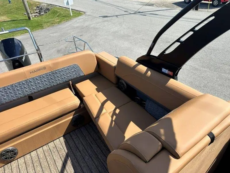Slide: The Image of Interior of 2026 Harris Solstice 230 SL with beige leather seating. - 24