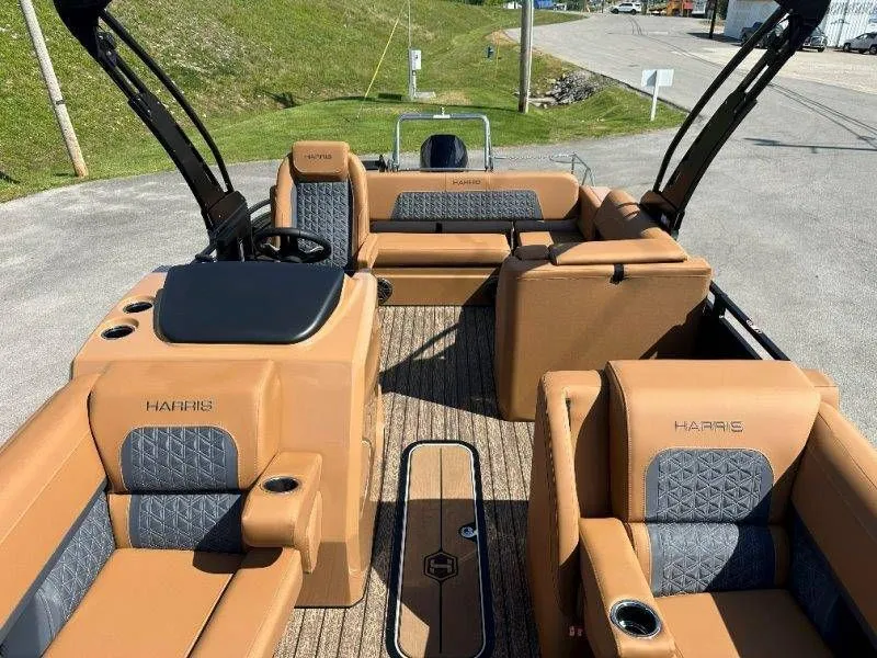 Slide: The Image of Interior of 2026 Harris Solstice 230 SL with luxurious seating. - 32