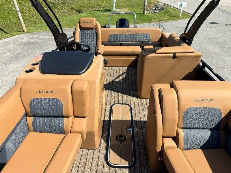 Slide: The Image of Interior of 2026 Harris Solstice 230 SL with luxurious seating. - 34