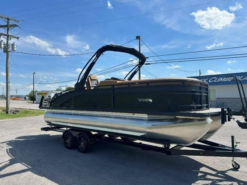 Slide: The Image of 2026 Harris Solstice 230 SL pontoon boat on trailer in sunny weather. - 38