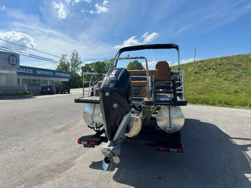 Slide: The Image of 2026 Harris Solstice 230 SL pontoon boat on trailer in sunny weather. - 39