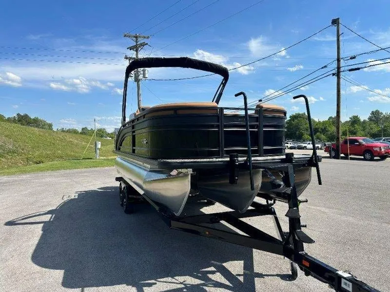 Slide: The Image of 2026 Harris Solstice 230 SL pontoon boat on trailer outdoors. - 42