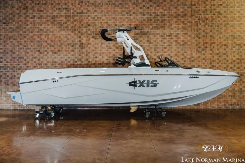 The Image of 2026 Axis T250 boat displayed indoors at Lake Norman Marina. - 1